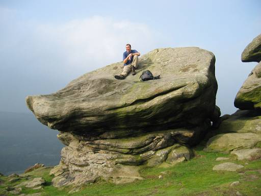 13_47-1.jpg - Henry on a rock on Froggat Edge - views have started to open up a little